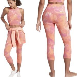 Athleta Salutation Slash Pocket Capri Leggings Orange Misses size M.